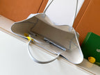Open tote bag interior with light lining and inner pocket