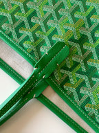Goyard tote bag corner with green fabric lining and stitched leather trim