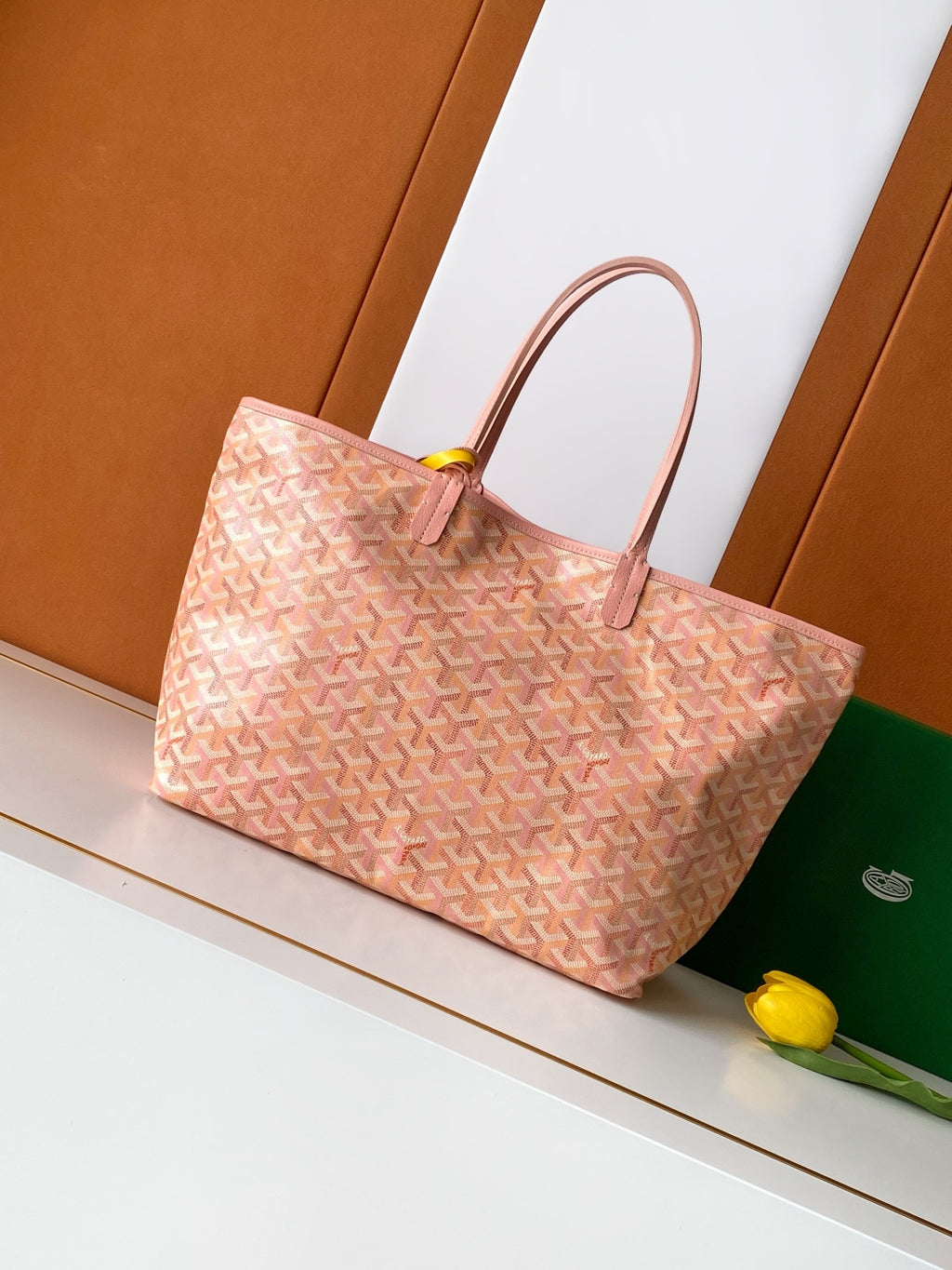 Goyard tote bag in pink patterned canvas with leather handles and top closure tab