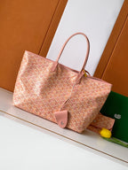 Tote bag in pink patterned canvas with leather handles and hanging leather tag