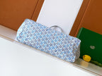 Light blue patterned tote bag lying down with top handles