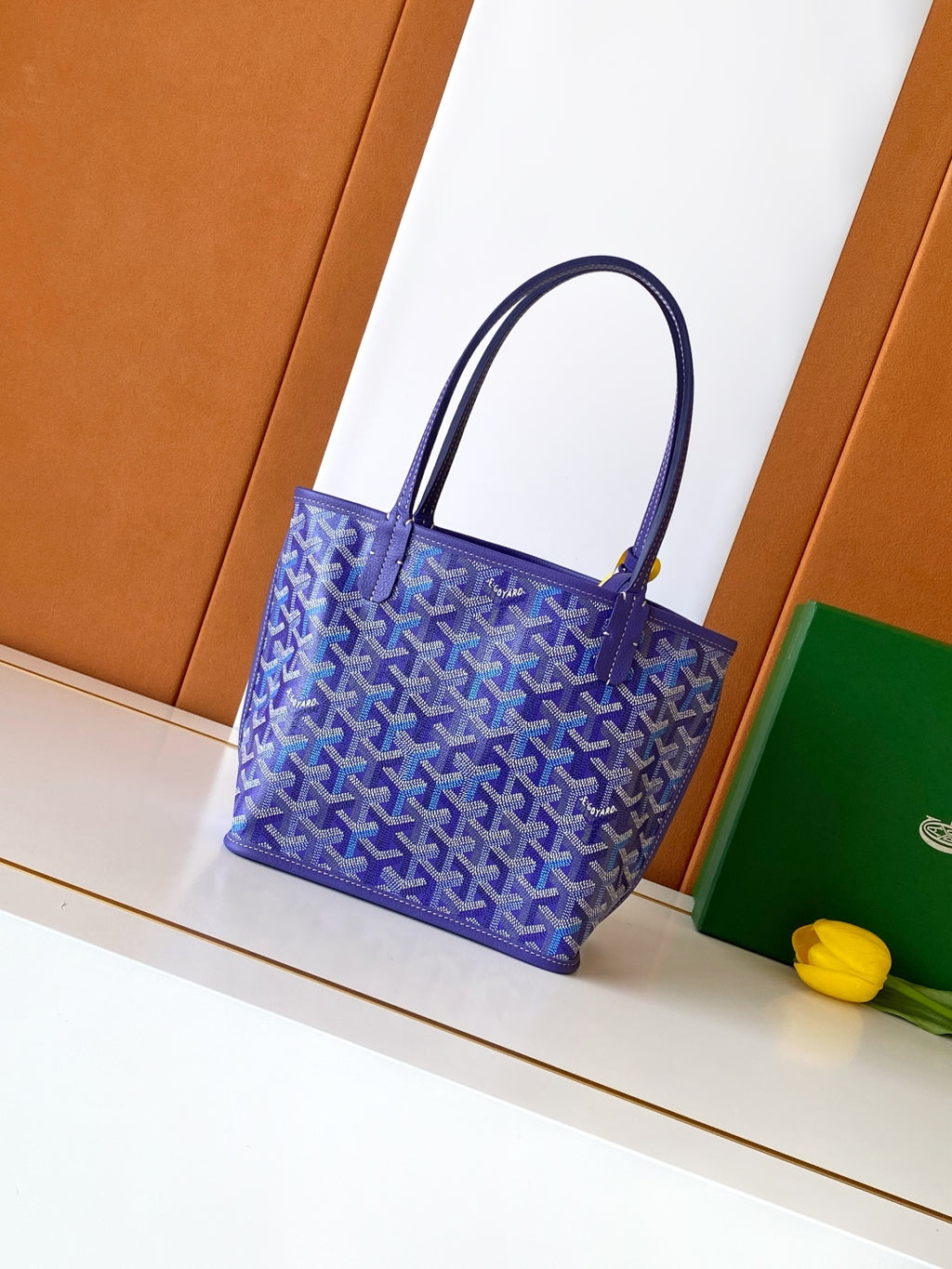 Goyard tote bag, blue Goyard pattern with dark top handles and structured leather edging