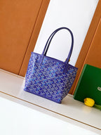 Goyard tote bag, blue Goyard pattern with dark top handles and structured leather edging