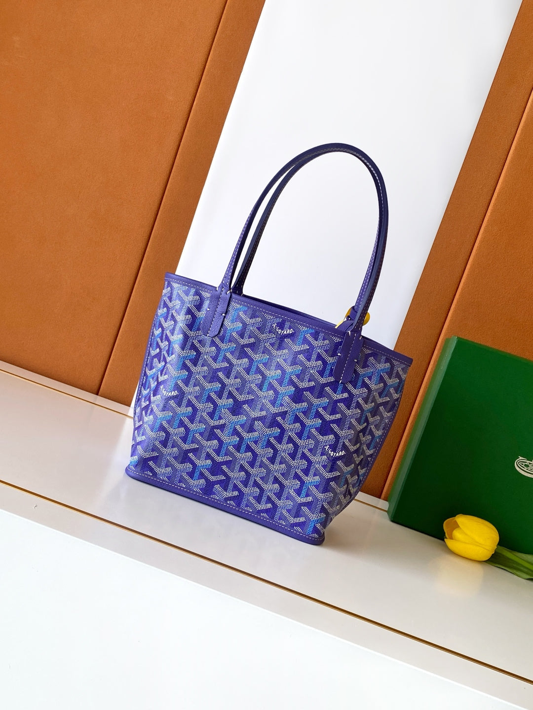 Goyard tote bag, blue Goyard pattern with dark top handles and structured leather edging