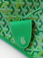 Green patterned tote bag tab with stitched edge and oval emblem