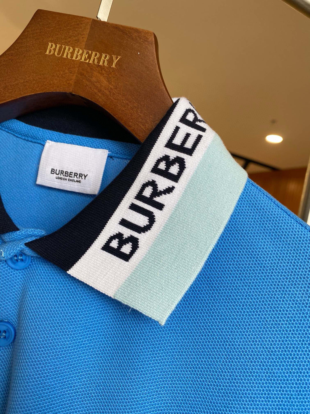 Blue Burberry polo shirt collar close-up with logo label and button placket