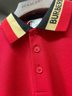 Red polo shirt neckline and buttons with striped Burberry collar