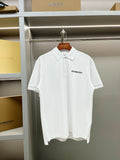White Burberry polo shirt on hanger, buttoned collar and short sleeves