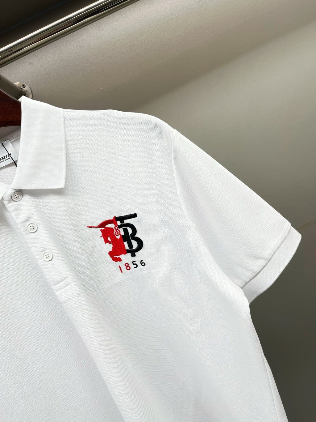 Burberry white polo shirt with red/black 1856 logo on back