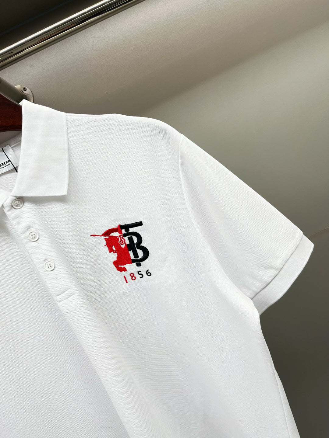 Burberry white polo shirt with red/black 1856 logo on back