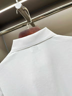 Burberry white polo shirt back collar area, smooth textured knit