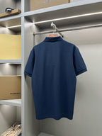 Dark blue polo shirt with short sleeves, plain back