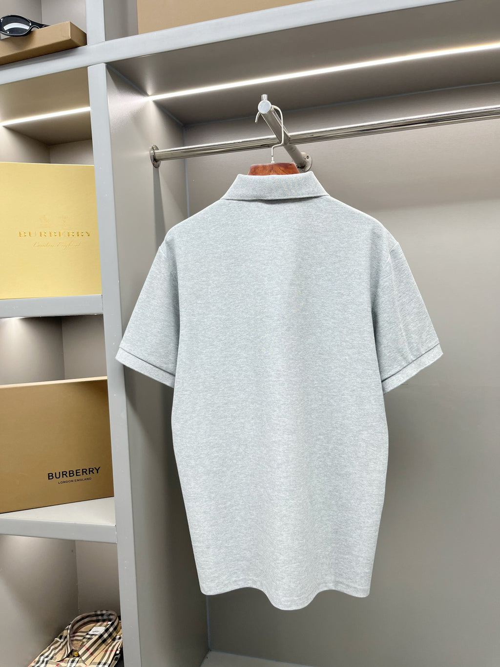 Light gray polo shirt back with matching collar and short sleeves
