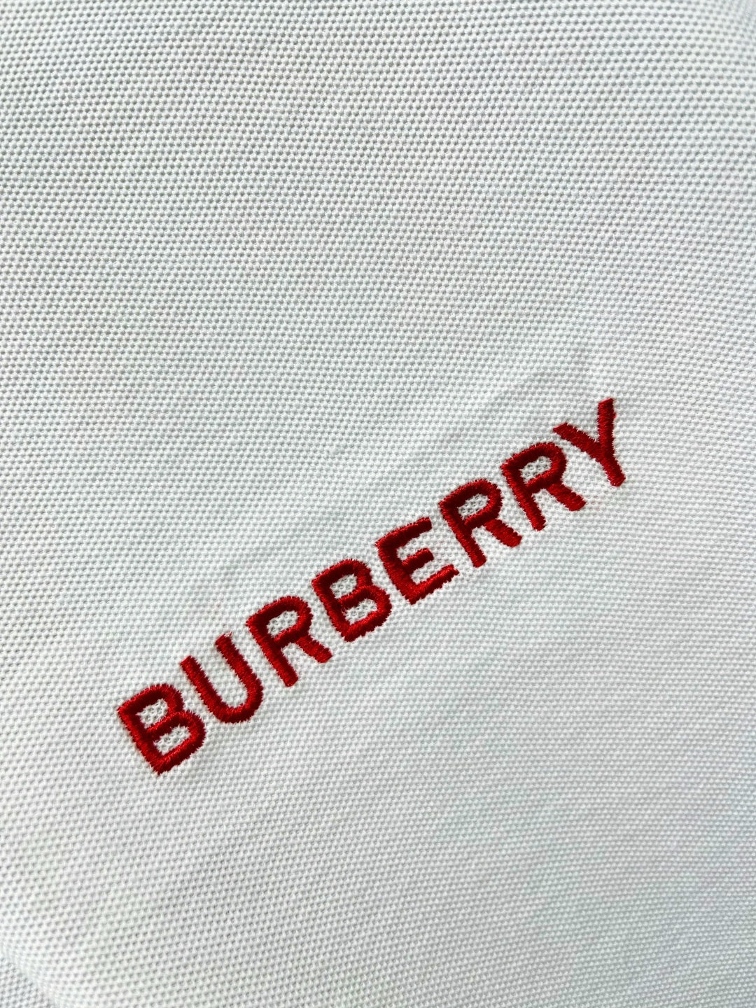 Burberry red logo embroidery on white polo shirt fabric