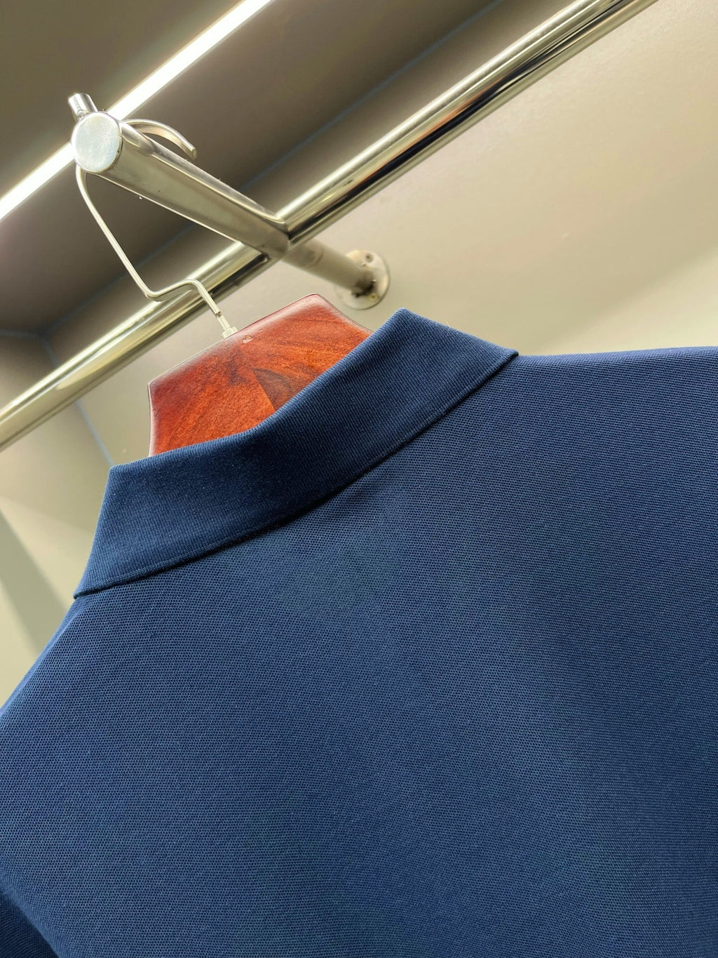 Blue Burberry polo shirt fabric close-up