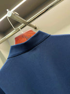 Blue Burberry polo shirt fabric close-up