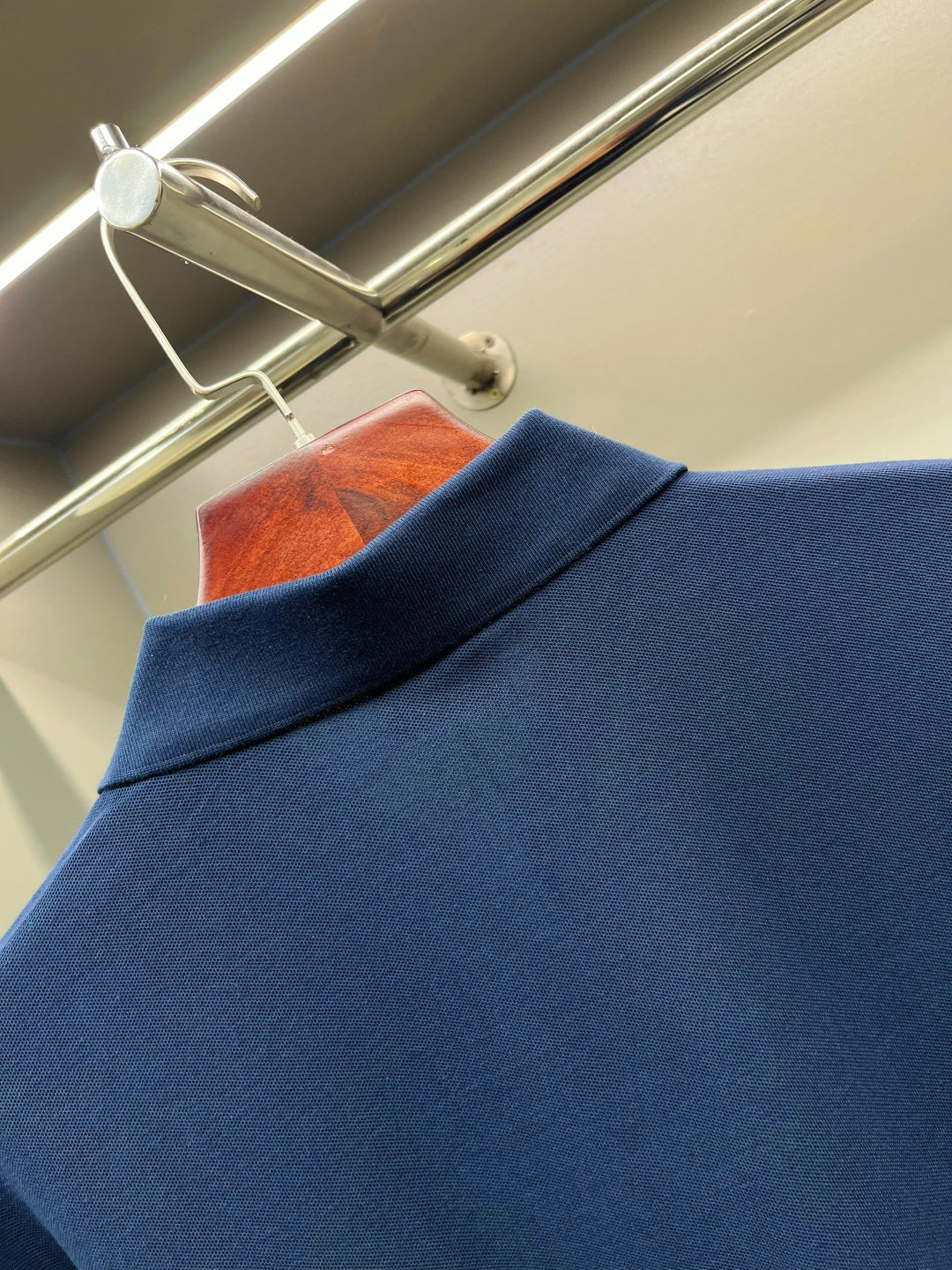 Blue Burberry polo shirt fabric close-up