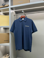 Blue Burberry polo shirt with button placket and chest logo