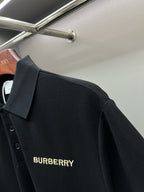 Burberry short-sleeve polo shirt, dark navy, chest logo and button placket detail