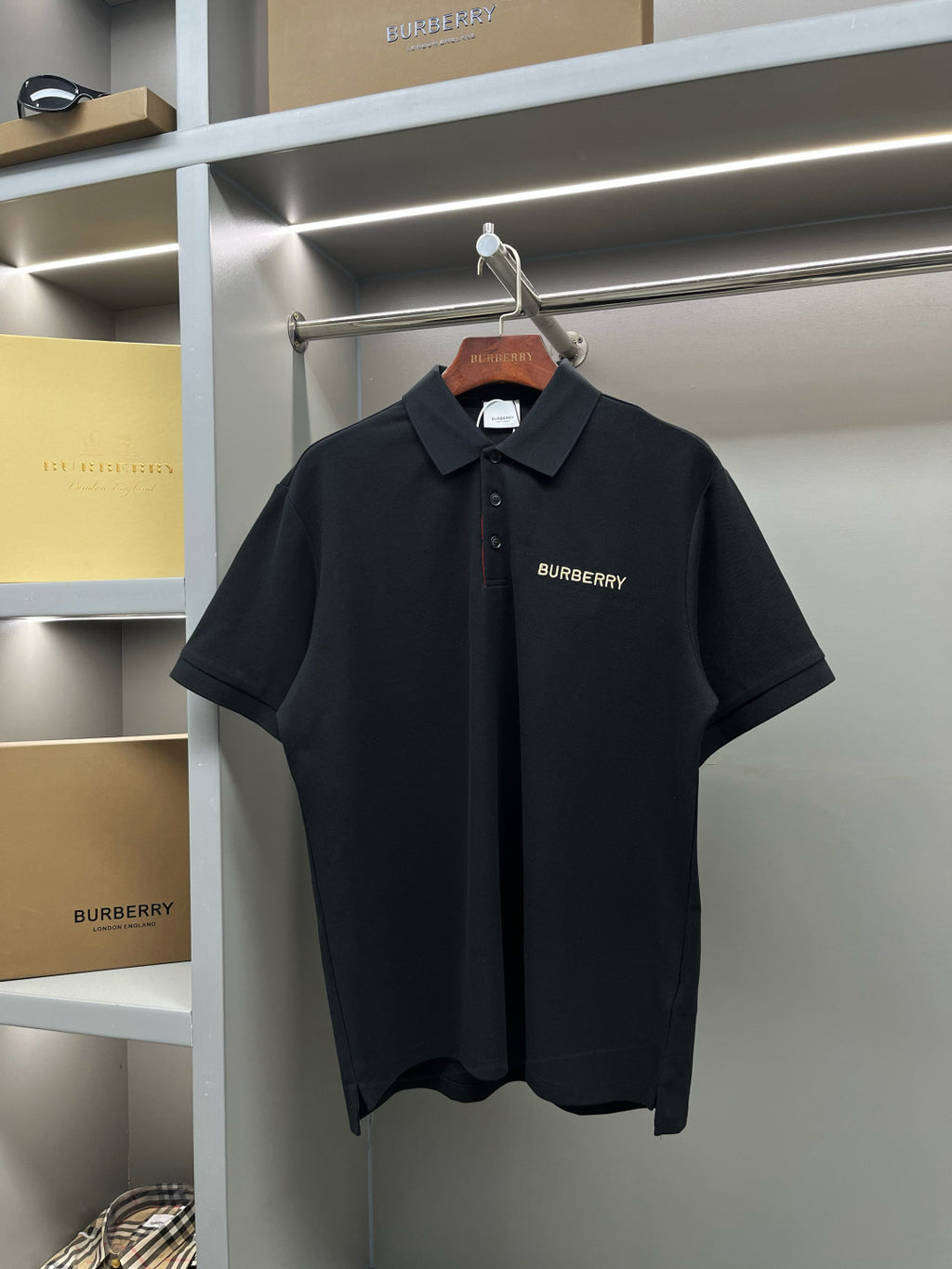 Burberry short-sleeve polo shirt, dark navy, button placket and chest logo