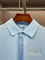 Burberry light blue polo shirt collar and button placket with embroidered chest logo