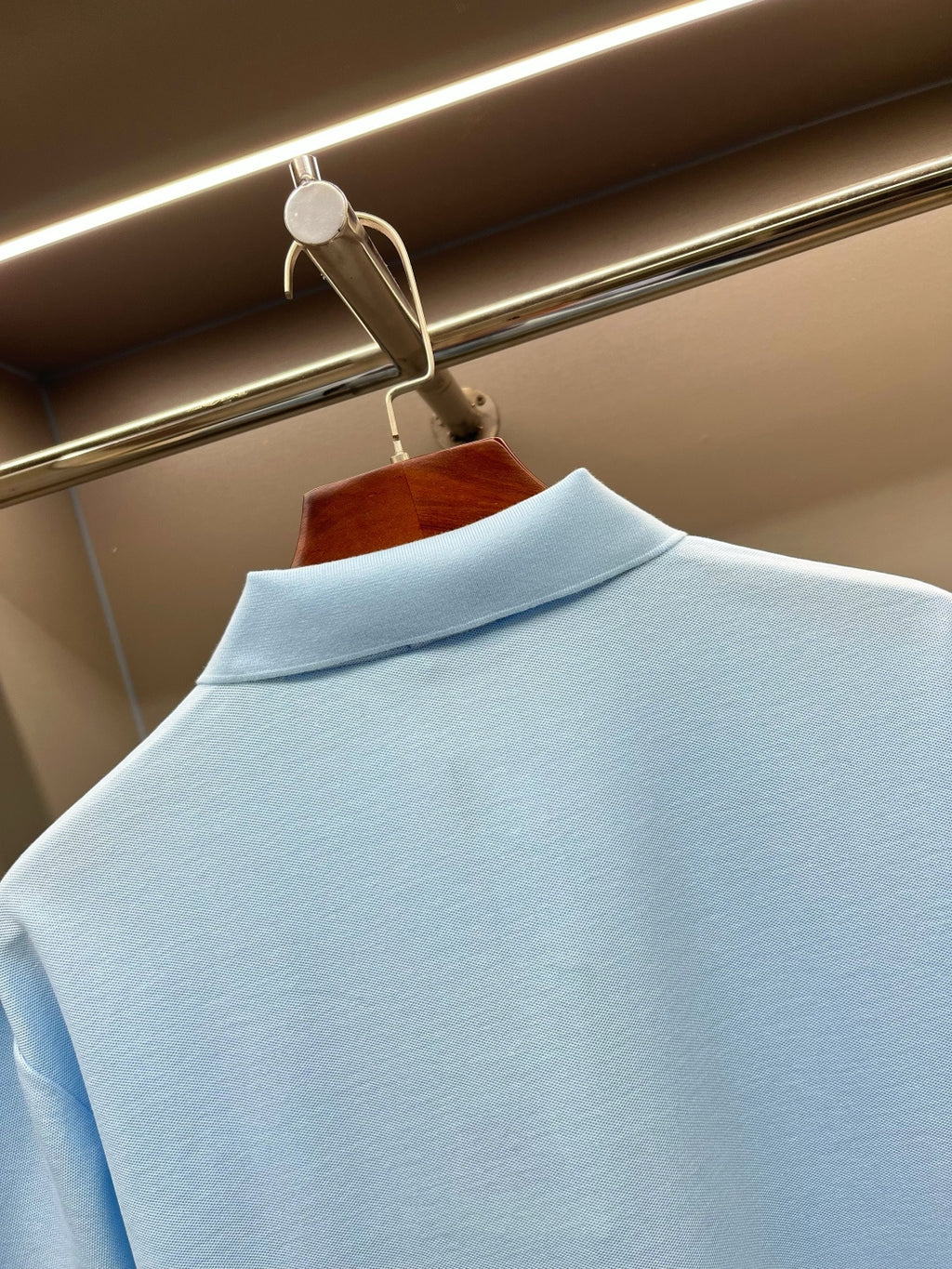 Burberry light blue polo shirt close-up of the high collar and neckline