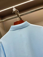 Burberry light blue polo shirt close-up of the high collar and neckline