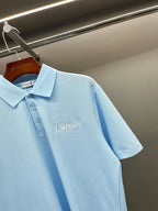 Burberry light blue short-sleeve polo shirt with embroidered logo on the chest