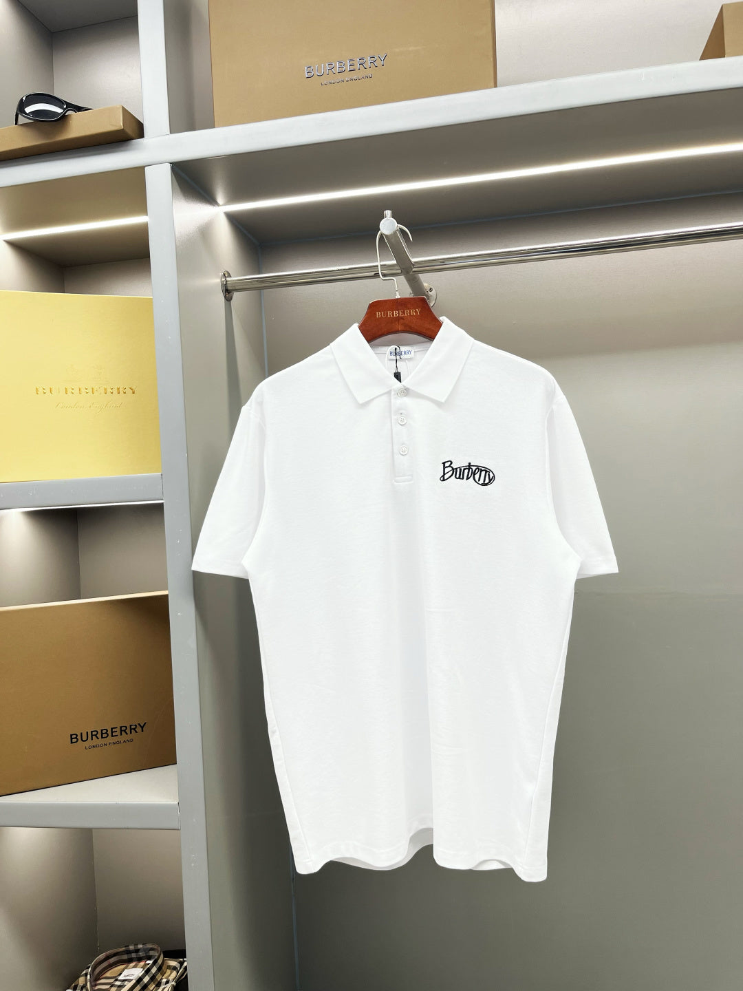 Burberry short-sleeve polo shirt in white, button placket and chest logo