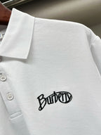 Burberry white short-sleeve polo shirt close-up of chest logo on knit fabric