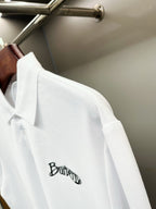 Burberry white short-sleeve polo shirt with chest logo and sleeve profile