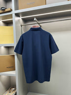Navy Burberry polo shirt back view on hanger, short sleeves