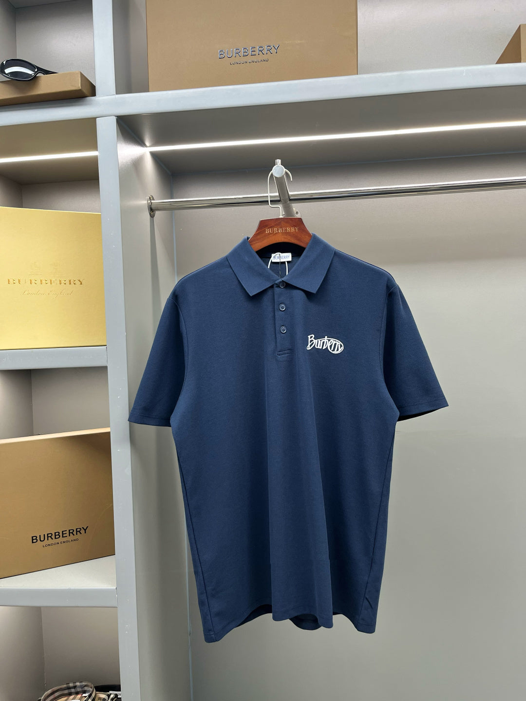 Navy Burberry polo shirt with button placket and chest logo