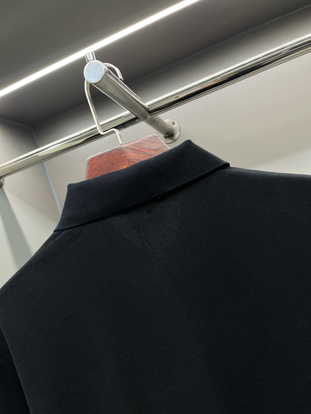 Burberry polo collar and neckline on dark navy shirt