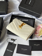 Small bag in light cream with front flap and gold Saint Laurent logo