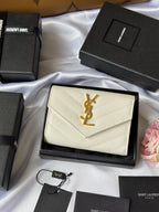 Small bag in light cream with quilted texture and gold Saint Laurent logo