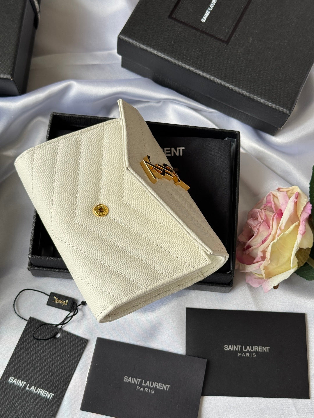 Small bag in light cream with front flap and gold Saint Laurent emblem