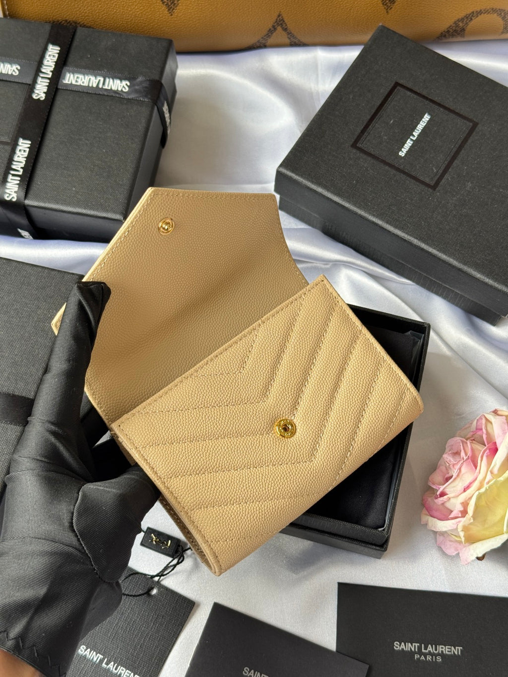 Small bag wallet in light yellow textured leather with flap and gold button detail