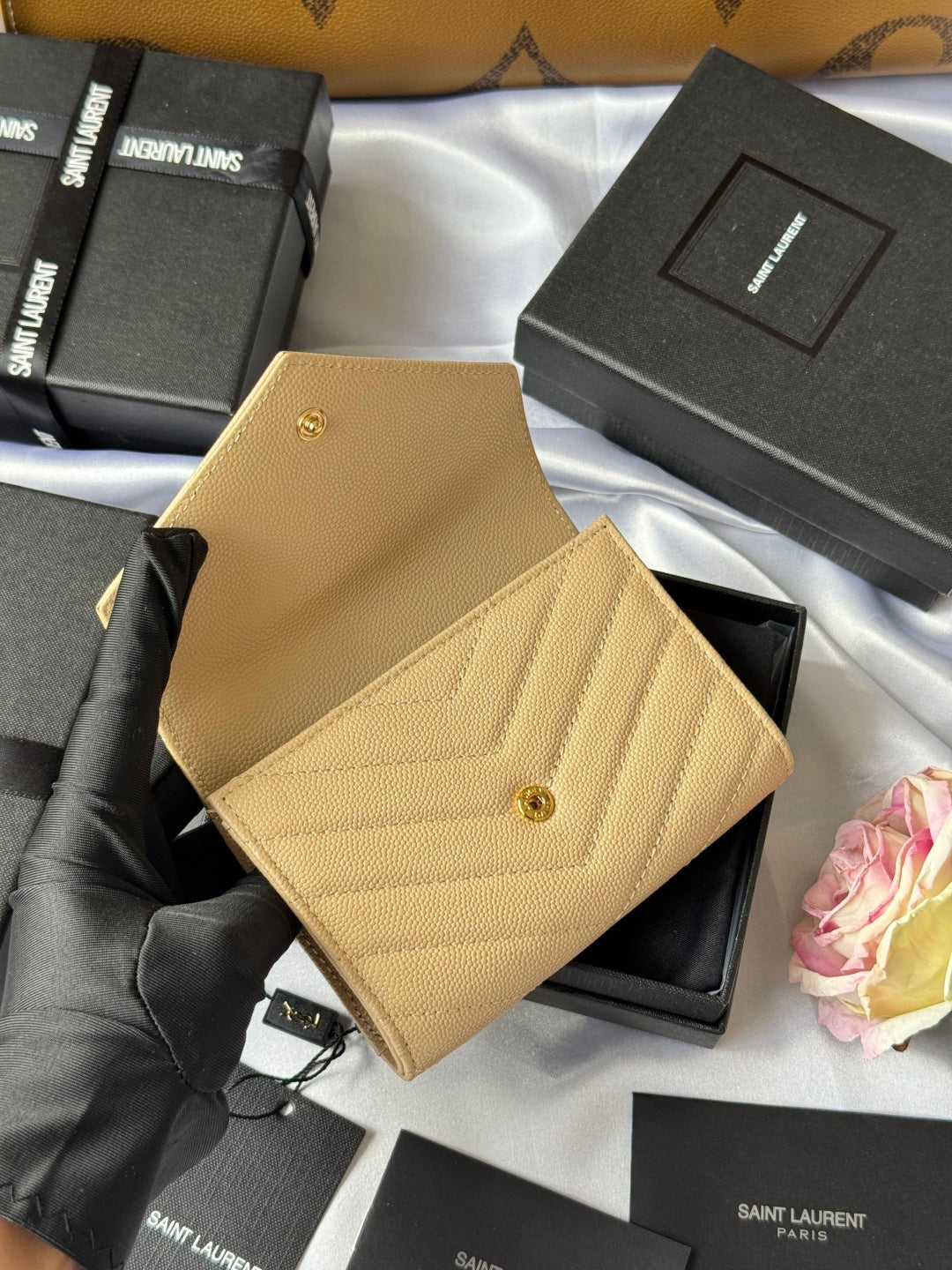 Small bag wallet in light yellow textured leather with flap and gold button detail