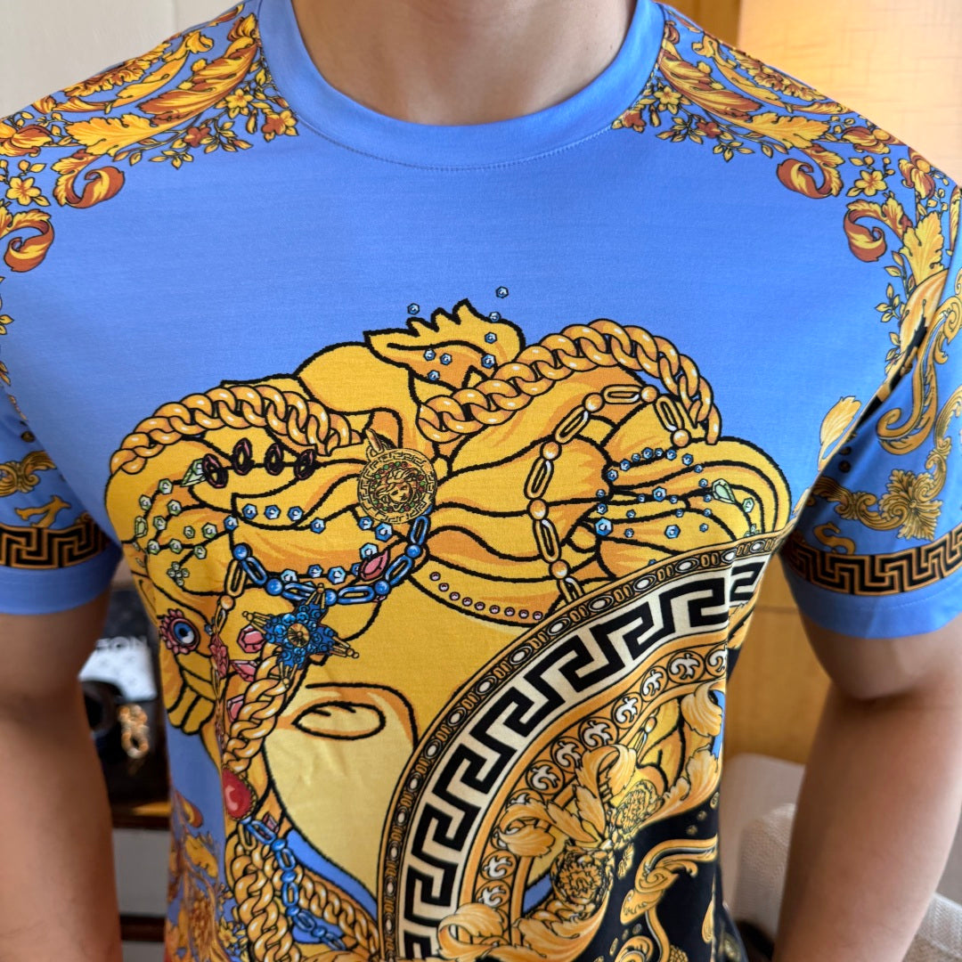 Versace short-sleeve T-shirt close-up of gold horse-like head and Greek key border