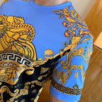 Versace short-sleeve T-shirt side view with blue swirl pattern and partial Greek border