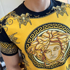 Gold and black T-shirt with Medusa-style face print and Greek key border
