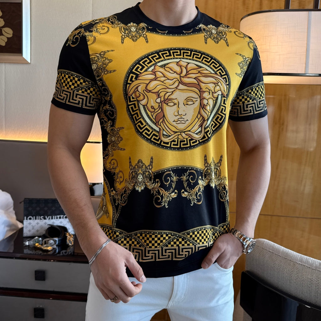 Graphic T-shirt with gold portrait front and black-and-gold Greek key hem band