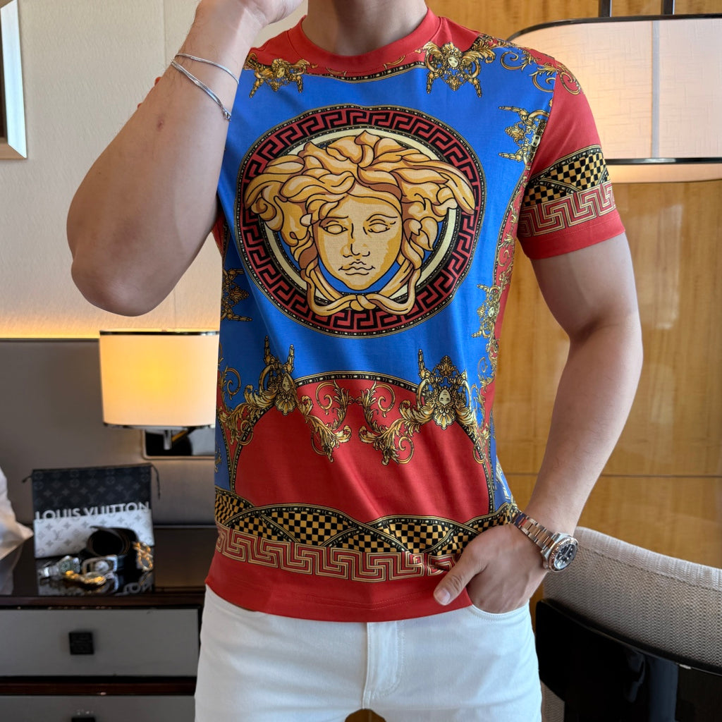 Versace T-shirt with blue-and-red design, gold face medallion at center front