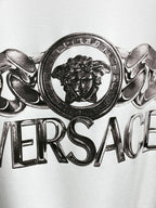 Versace white crewneck T-shirt close-up of lion crest medallion logo