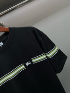 Black T-shirt shoulder and chest stripe band with small horse rider logo