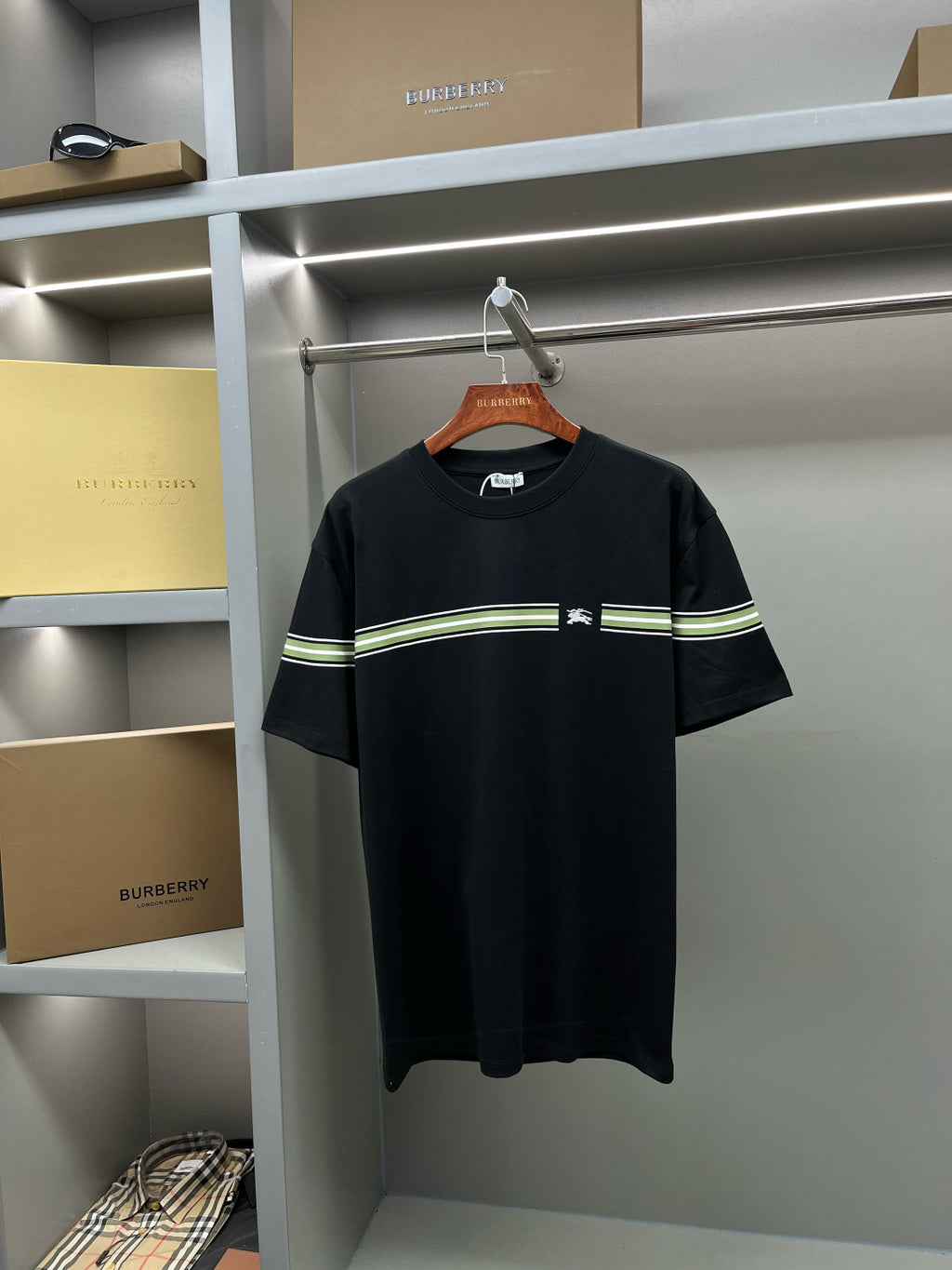 Black Burberry short-sleeve T-shirt with green-and-white stripe band and chest logo