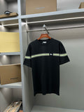 Black Burberry short-sleeve T-shirt with green-and-white stripe band and chest logo