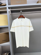 White Burberry T-shirt with gold stripe band and small chest logo, on hanger