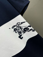 Burberry T-shirt sleeve detail with white stripe and navy horse graphic
